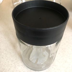 Kitchen gadgets: glass jars, herb scissors and popsicles mold.